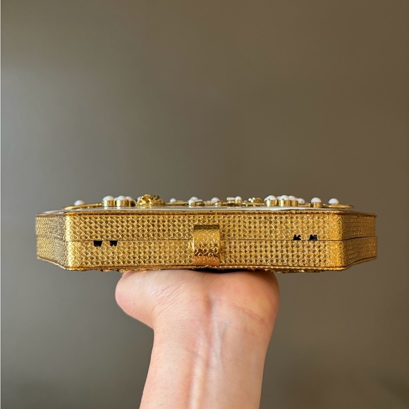 Elegant White and Gold Clutch with Floral Design